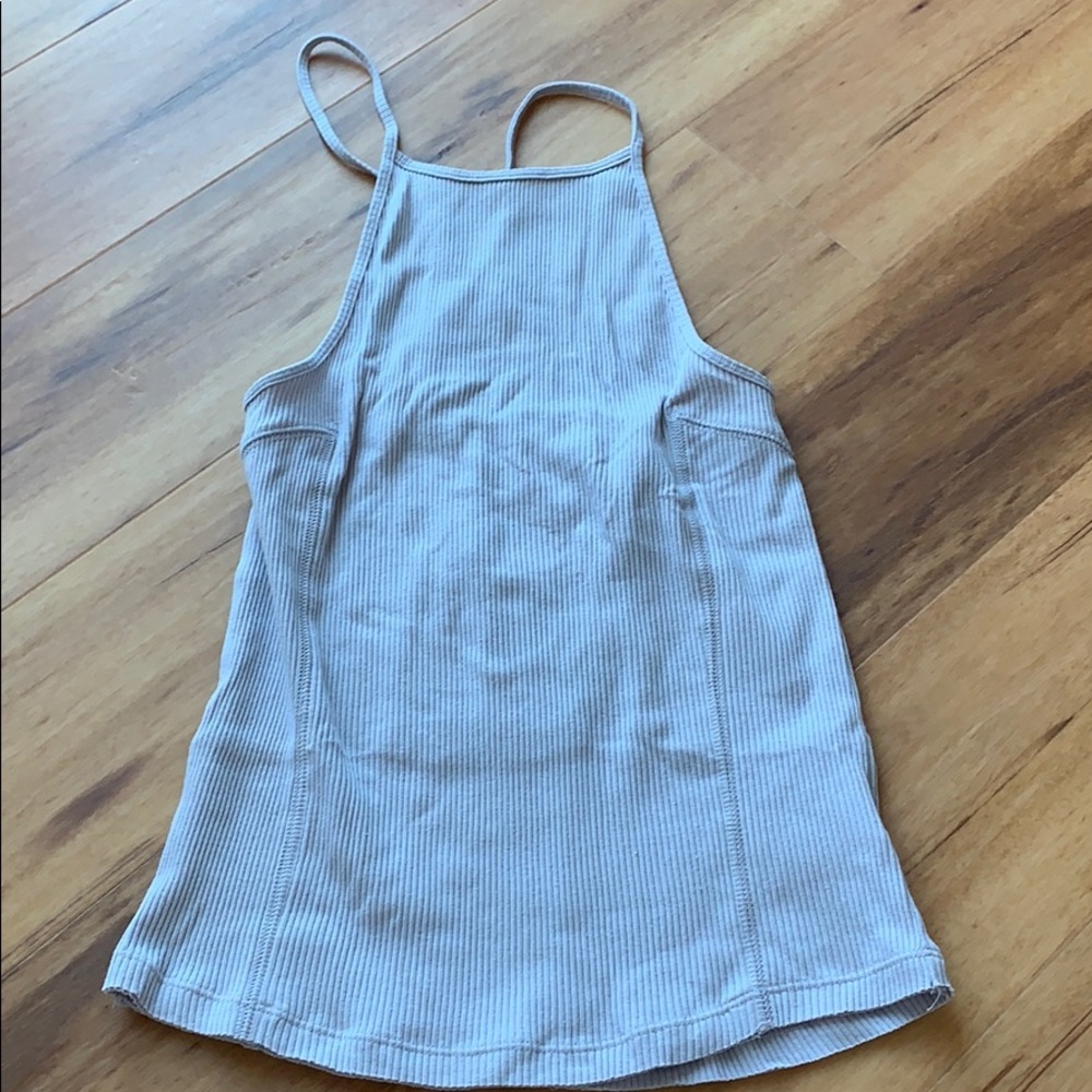 High neck, lace up back tank. Medium
